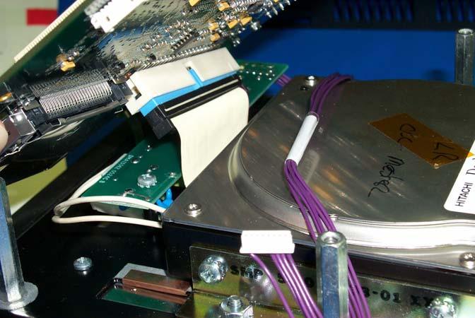 Figure 9: Accessing the Hard Drive Cable (Ribbon) Hard Drive Cable 5 Gently lift the CPU board off