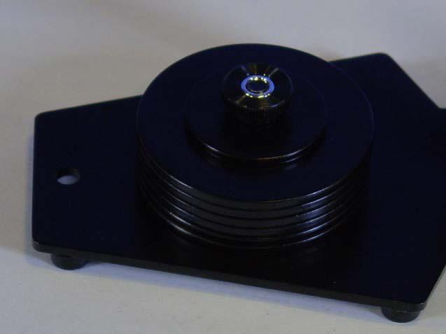 Secure COUNTER WEIGHT DISKS with the BLACK THUMB NUTS as shown in this photo and repeat this procedure for the COUNTER WEIGHT