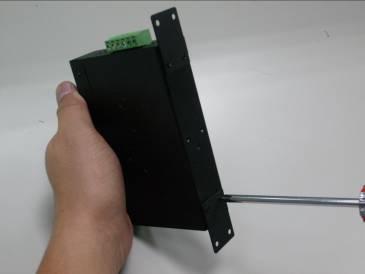 2.2.3 Wall Mount Plate Mounting To install the Industrial PoE Switch on the wall. Please follow the instructions below. Step 1: Remove the DIN-Rail from the Industrial PoE Switch.