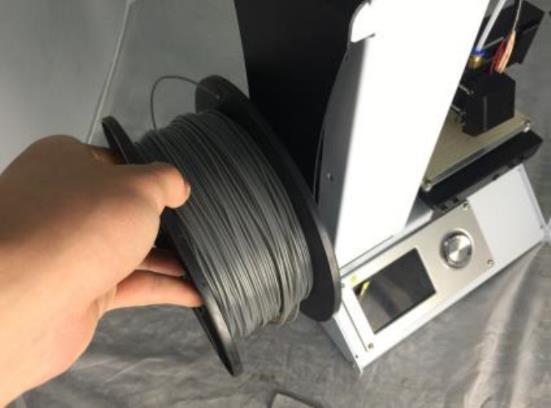 Using a pair of scissors or side cutters, diagonally snip the end of the filament to make a point, as shown in the images below. 15.