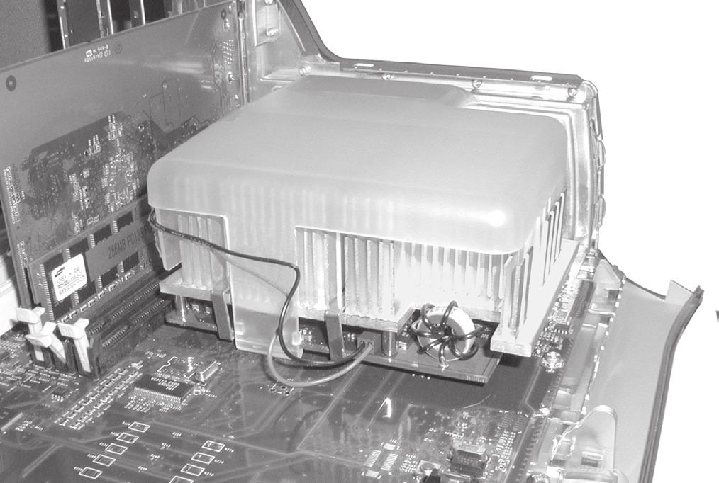 clip clip Figure 20 Locate the clips securing the processor heat sink to the processor card (Figure 21); your heat sink may appear different from what is pictured.