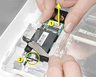 2. Important: Do not strain or remove the LVDS cable. Gently move the LVDS cable aside, and remove the two screws from the modem. 3. Tilt up the end of the modem to disconnect it from the logic board.