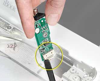 2. Tilt up the DC board, and use a black stick to disconnect the cable connector from the DC board. 3.