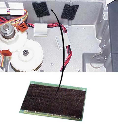 4. Remove backing from 4 inch Velcro strip and apply to center of solder side of the Hand Held Products interface PCBA. See Figure 3. 5.