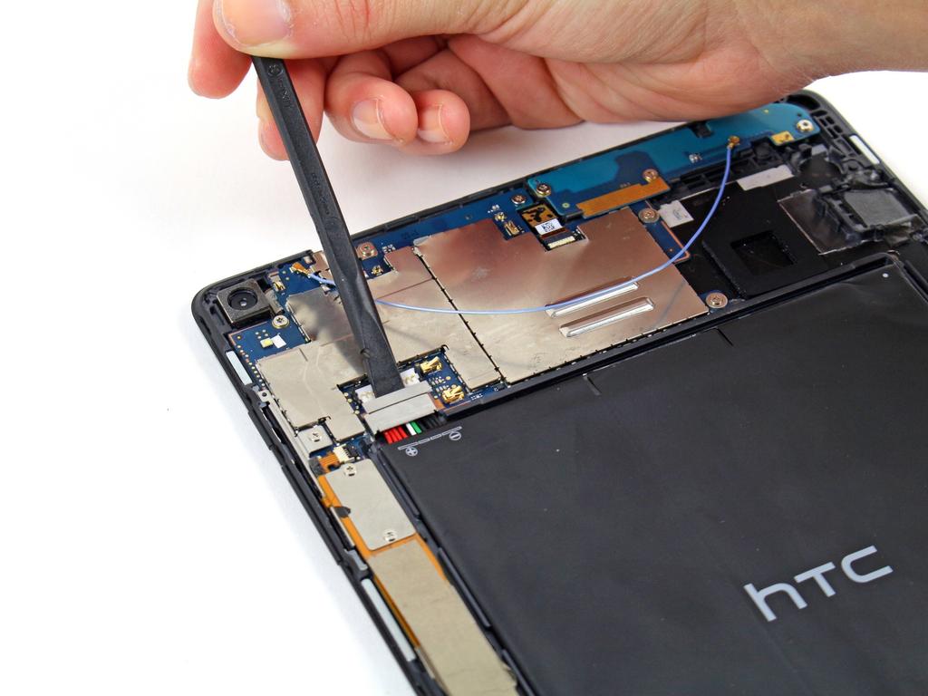 Do not pull the battery from the tablet yet, as it is still connected to the motherboard.