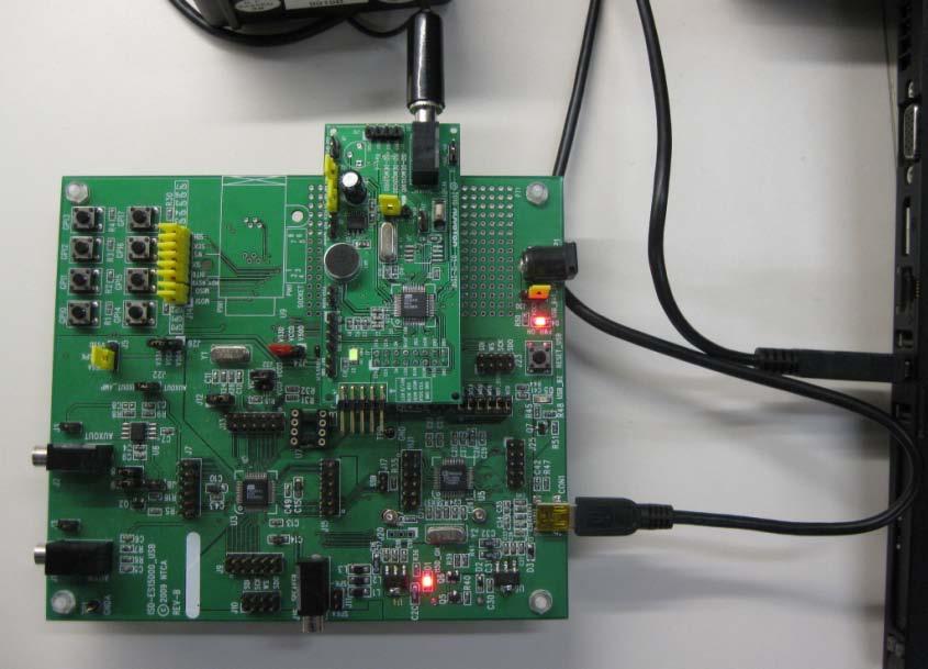 Figure 7 ISD-DEMO15100 is connected onto ISD-ES15D00_USB mother board So users have two options to use the ISD-DEMO15100 board: o ISD-DEMO15100 + the big ISD15XXX evaluation board, shown in Figure 7.