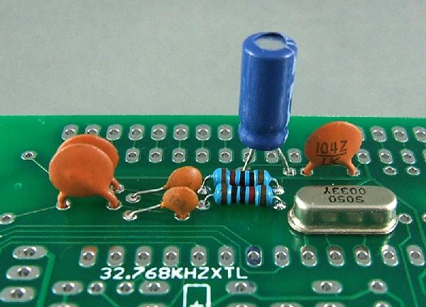 lead of C14 being next to C5 Note that the leads on the electrolytic capacitor had