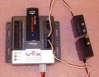Disregard the other lights as you are only interested in the VEXnet light. Tethering may take up to one minute. When finished, turn off the units, attach the VEXnet keys and power both units on.
