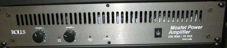 7 There are also left and right Volume Control Dials, located on the left side of the Amplifier. The Amplifier is located at the bottom of the rack of equipment.