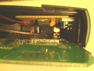 and tinning a spot on the WRT54G's pc board as shown in Figure 14.