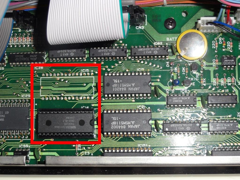 Step 2: Fig. 3 - IC14 and IC15 location Now that the DX7 is opened, locate IC14 and IC15. They are very close to the internal battery and are marked in the photo above with a red box around them.
