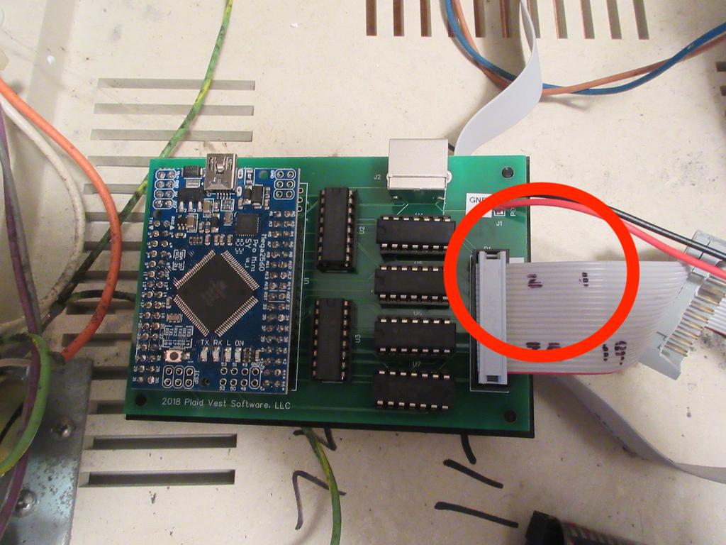 unplugged in Step 2) into the NEWKEY/80 ribbon cable box connector (aligning Pin 1).