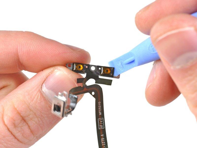 plastic opening tool to remove the steel brackets for the volume buttons and