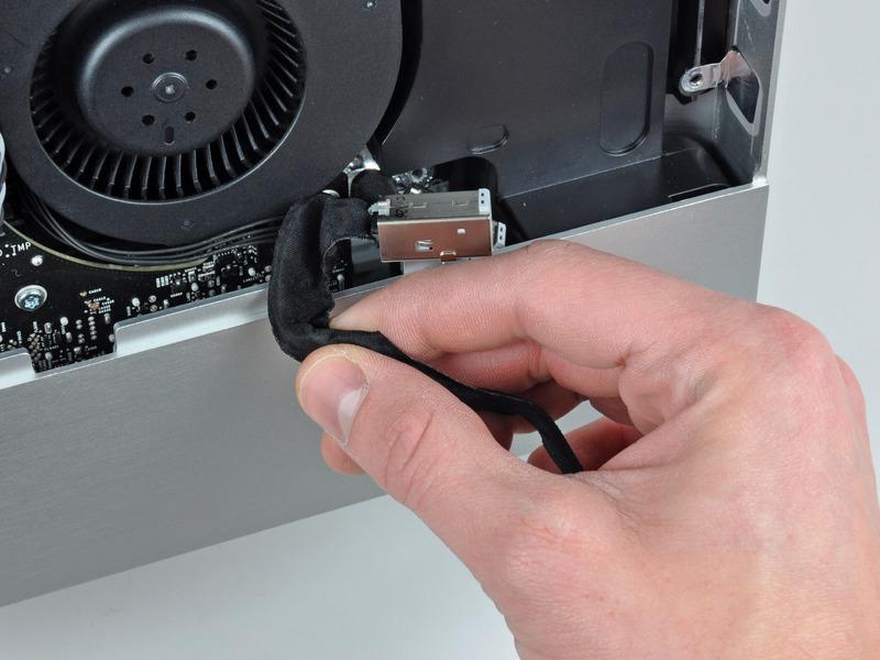 A pair of tweezers is helpful to put the ports back in place.