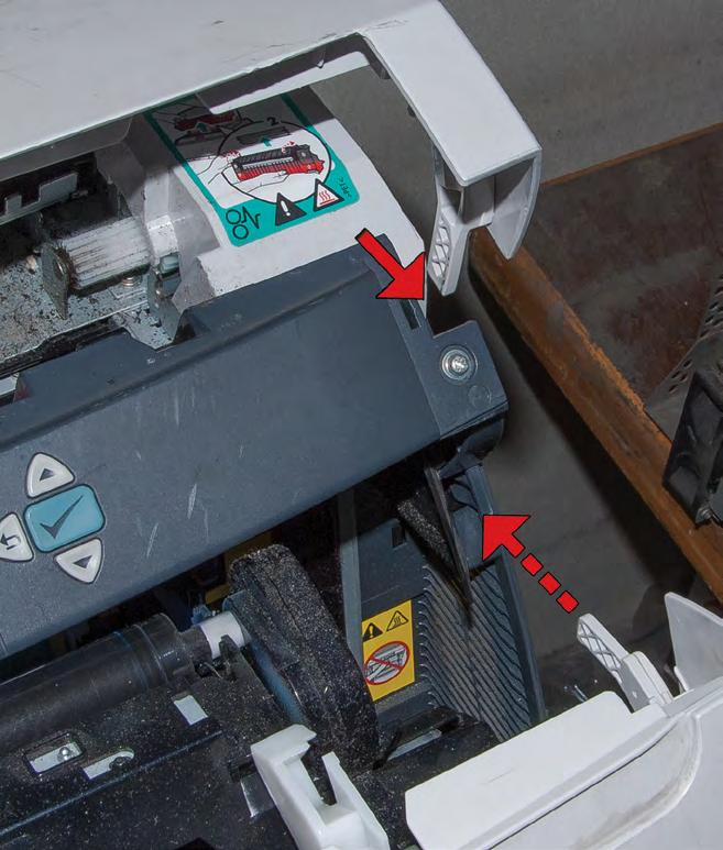 If a door is left open, or if one of these switches fails, you will get an error condition either a blinking light (on lowerlevel printers) or a Door Open message on the printer s display.