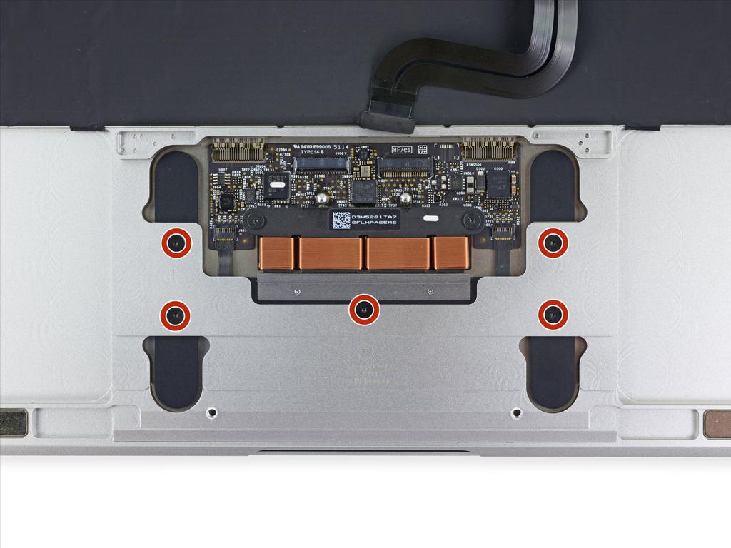 Step 18 Remove the five 2.5 mm T3 Torx screws securing the trackpad to the case.