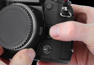 from the adapter. 3. Reattach the front lens cap to the lens adapter. 4.