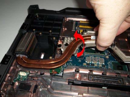 4. Carefully lift the processor plate of the assembly up at an angle. 5. Remove the radiator from the computer. 8.