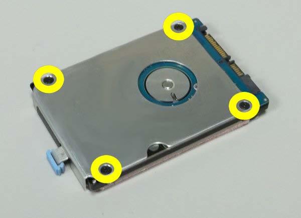 5. Slide hard drive out of the carrier. 26.2 Replacing the Hard Drive NOTICE: Hard drives are extremely fragile. Exercise care when handling the hard drive.