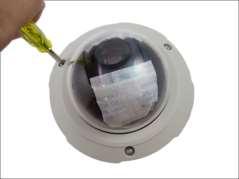 If the cables will pass through the surface, remove the metal cap covering the bottom hole of the