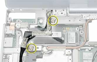 3. Remove the two screws securing the flat section of the LVDS cable. Warning: Be careful not to strain the LVDS cable. 4. Peel up the clear tape that attaches the LVDS cable to the modem sleeve. 5.