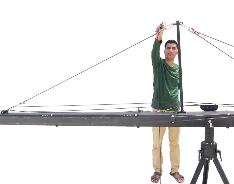clamp on jib section 7 & adjusting the cable with the help of