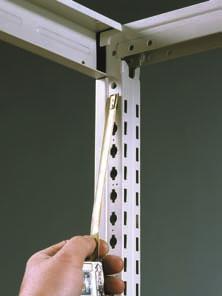 A measuring tape can be hooked to a slot marking the starting point for measurements on the heights required to mount devices.