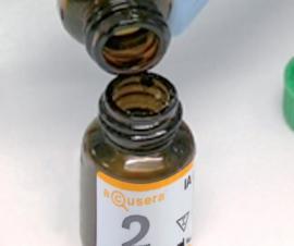 Carefully open and remove the bung from a vial of serum and a vial of serum diluent. 3. While holding the serum vial steady on the bench, carefully pour all the diluent into the serum vial.