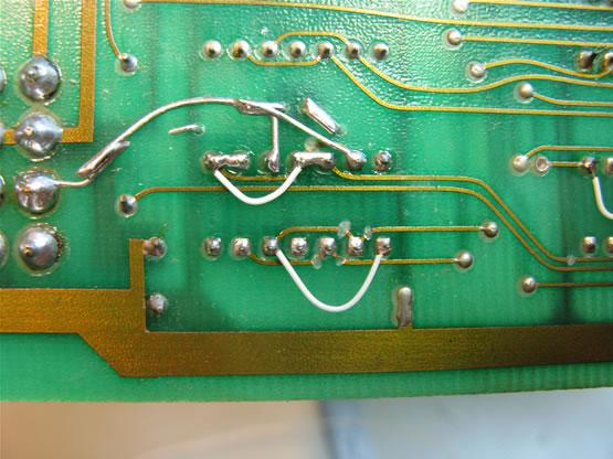 K Solder and clip leads Resistor bent and clipped, soldered from top side