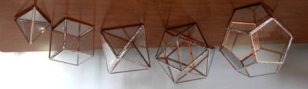 Platonic Solids A regular polyhedron is one whose faces are identical regular polygons.