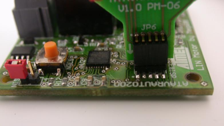 The AVR ISP programming interface is integrated in AVR Studio. An additional adaptor has to be used to program the board using ISP or JTAG mode.