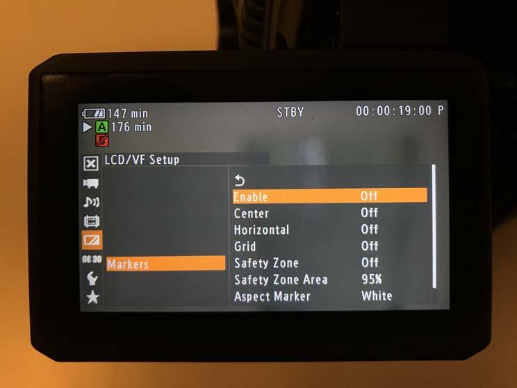 - Navigate to LCD/VF SETUP and set MARKER to ENABLE > OFF, as
