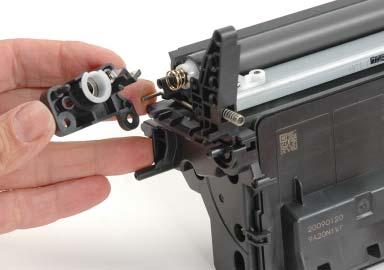 Remove the end cap and mag roller drive gear (See photo 20).