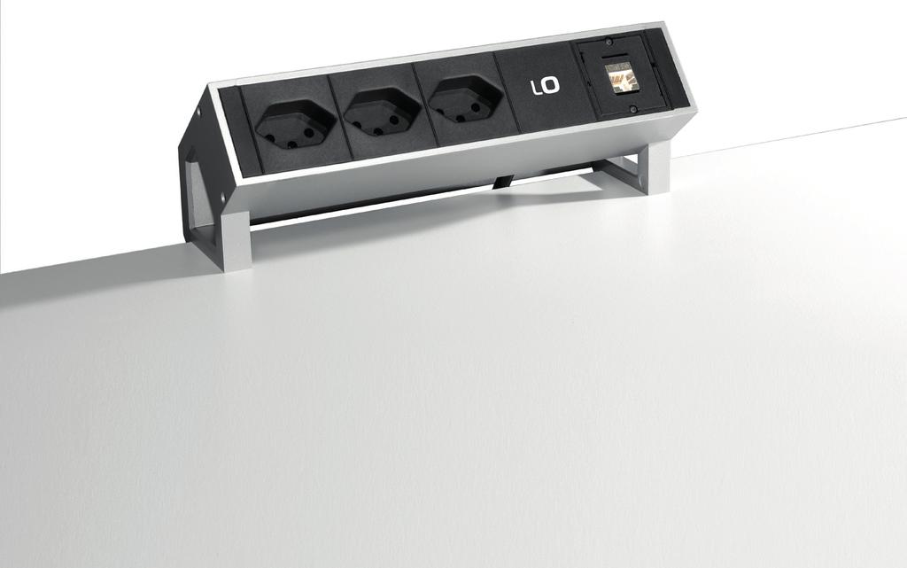 Desk 2 The modular power strip was designed to save space and add flexibility in offices, meeting rooms,