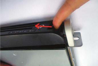 2. Press the latch and push the right end towards the unit s right handle until it clicks into place. 3.