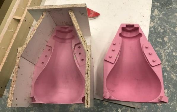 The molds are painted first with the desired gel coat color,
