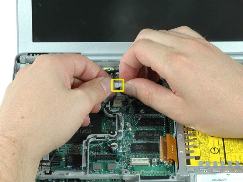 either separate the cable from its connector or the socket from the logic board. Carefully disconnect six indicated connectors from the logic board.