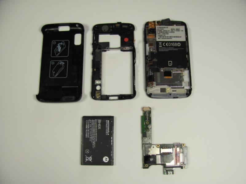 Step 11 After disconnecting the motherboard, there should be five distinct and separate parts of the phone: back