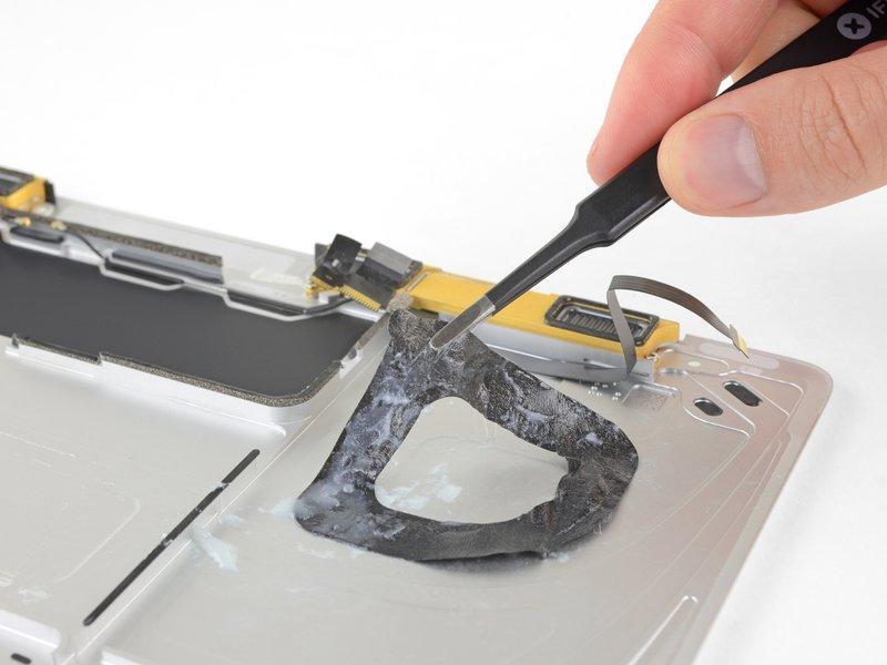 Before installing your new battery, remove all the remaining adhesive from the MacBook's case.