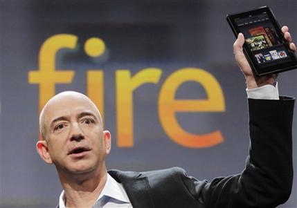 Jeff Bezos, Chairman and CEO of Amazon.com, introduces the Kindle Fire at a news conference, Wednesday, Sept. 28, 2011 in New York. The e-reader and tablet has a 7-inch (17.