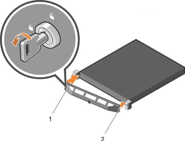 1. Locate and remove the bezel key. NOTE: The bezel key is attached to the back of the bezel. 2. Hook the right end of the bezel onto the chassis. 3. Fit the free end of the bezel onto the system. 4.