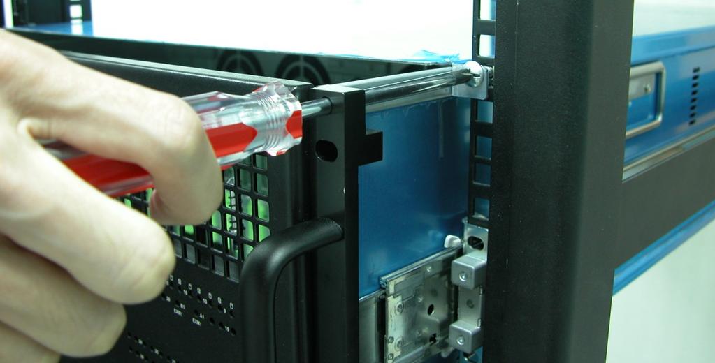 14. Use six (6) M5 screws to lock the enclosure into the rack post, one screw in each corner.