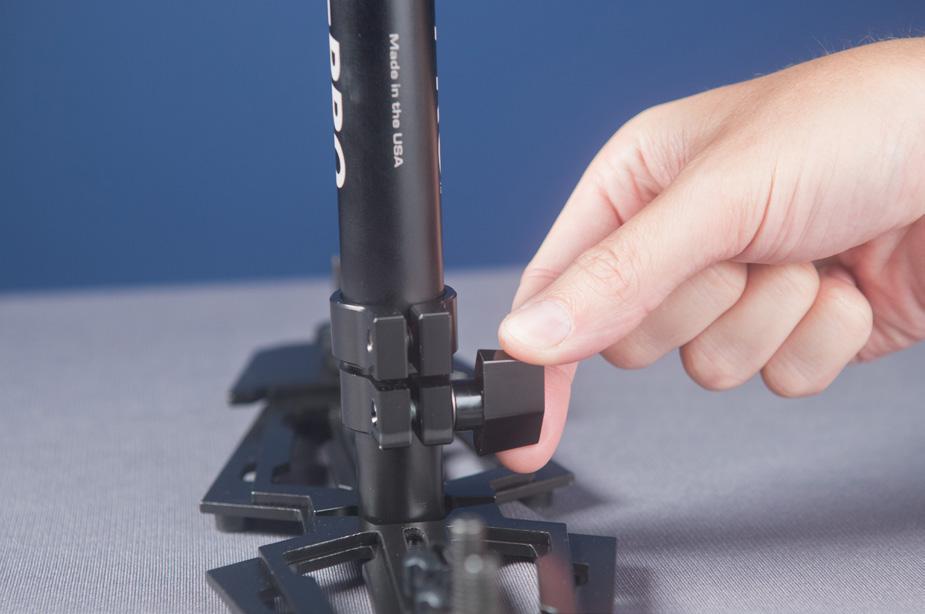 To align the TELESCOPING CLAMP ADJUSTMENT KNOB simply rotate the entire CENTRAL POST into the correct position, and tighten the ADJUSTMENT KNOB.