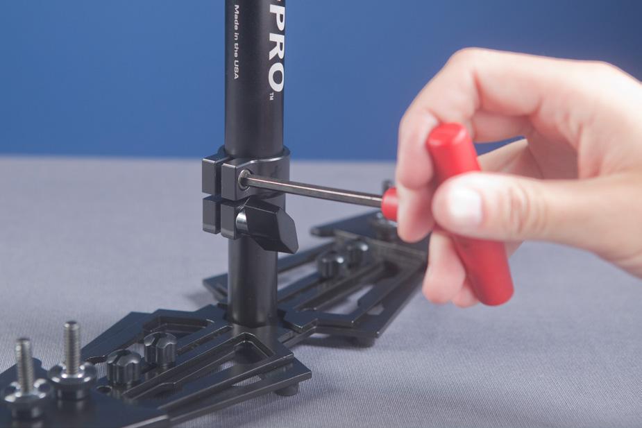There are two ways to create this correct alignment. The first and easiest is to loosen the ADJUSTMENT KNOB on the TELESCOPING CLAMP and rotate the parts until correctly aligned.