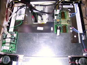 15 Monitor Removal 1. Turn off and unplug the game. 2. Place something in front of the game to brace the bezel once the strain relief cord is undone, then unlock and open the CPU section. 3.