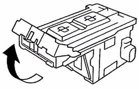 6. Grip both sides of the staple cartridge,