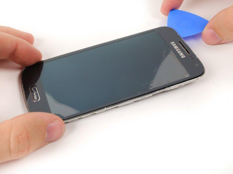 Apply additional heat as needed to soften the screen adhesive.