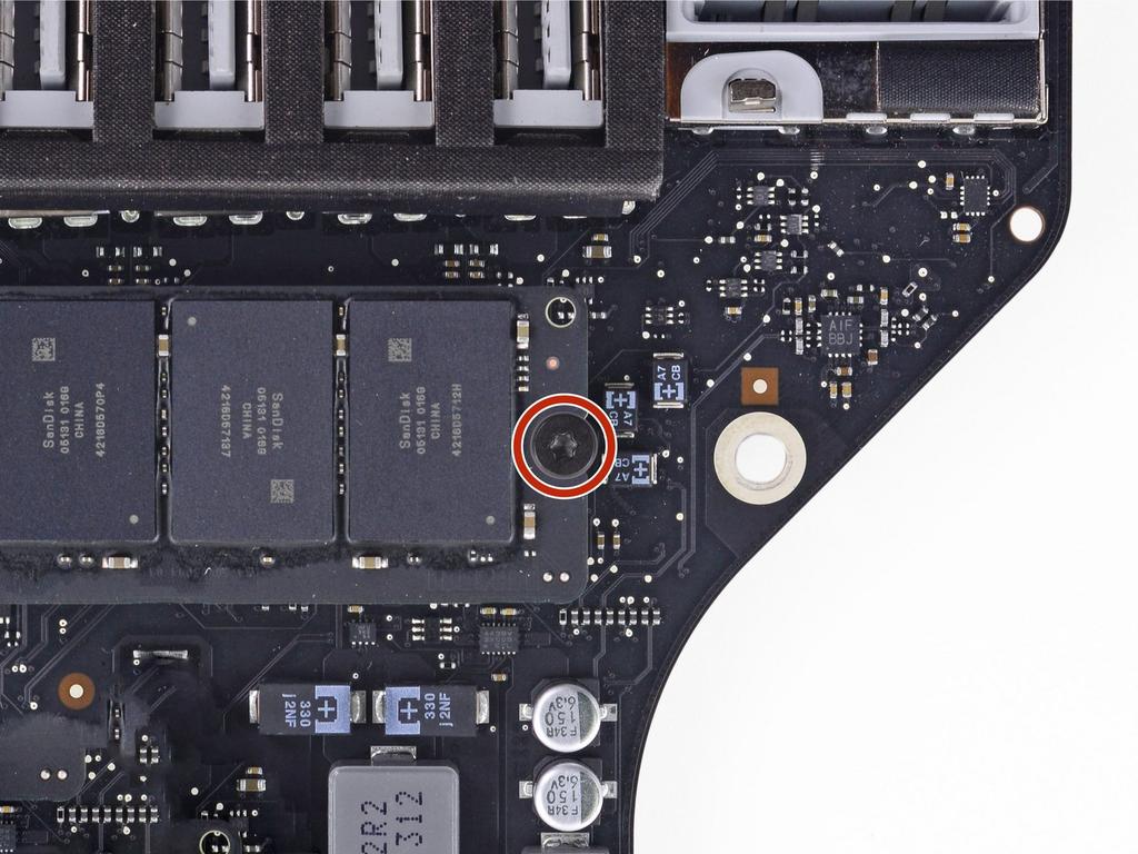 Torx screw securing the SSD to