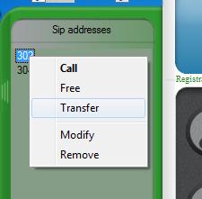 First, select a party from the directory list and click on the button. This allows you to transfer the current call to another contact.
