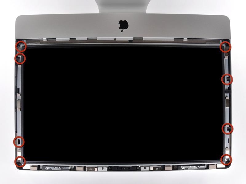 Pull the glass panel away from the lower edge of the imac and carefully set it aside.
